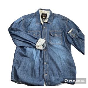 Blue Denim button down shirt Floral trim inside and at cuffs long sleeve Pockets